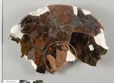 Terracotta fragment of a kylix (drinking cup)