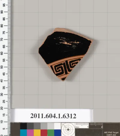 Terracotta fragment of a kylix (drinking cup)